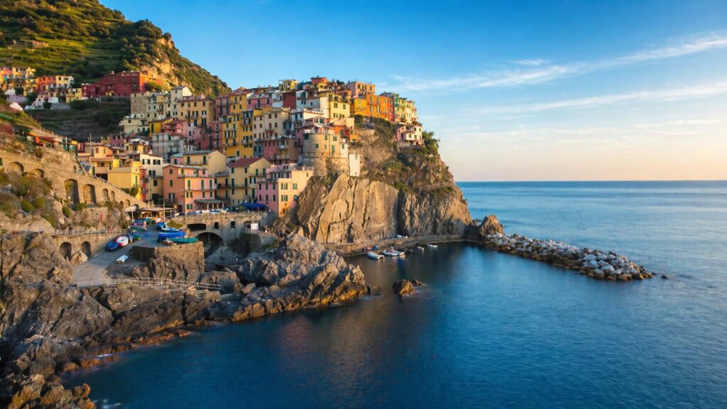 Colorful seaside village on Ligurian coast Italy with cliffs and Mediterranean sea view